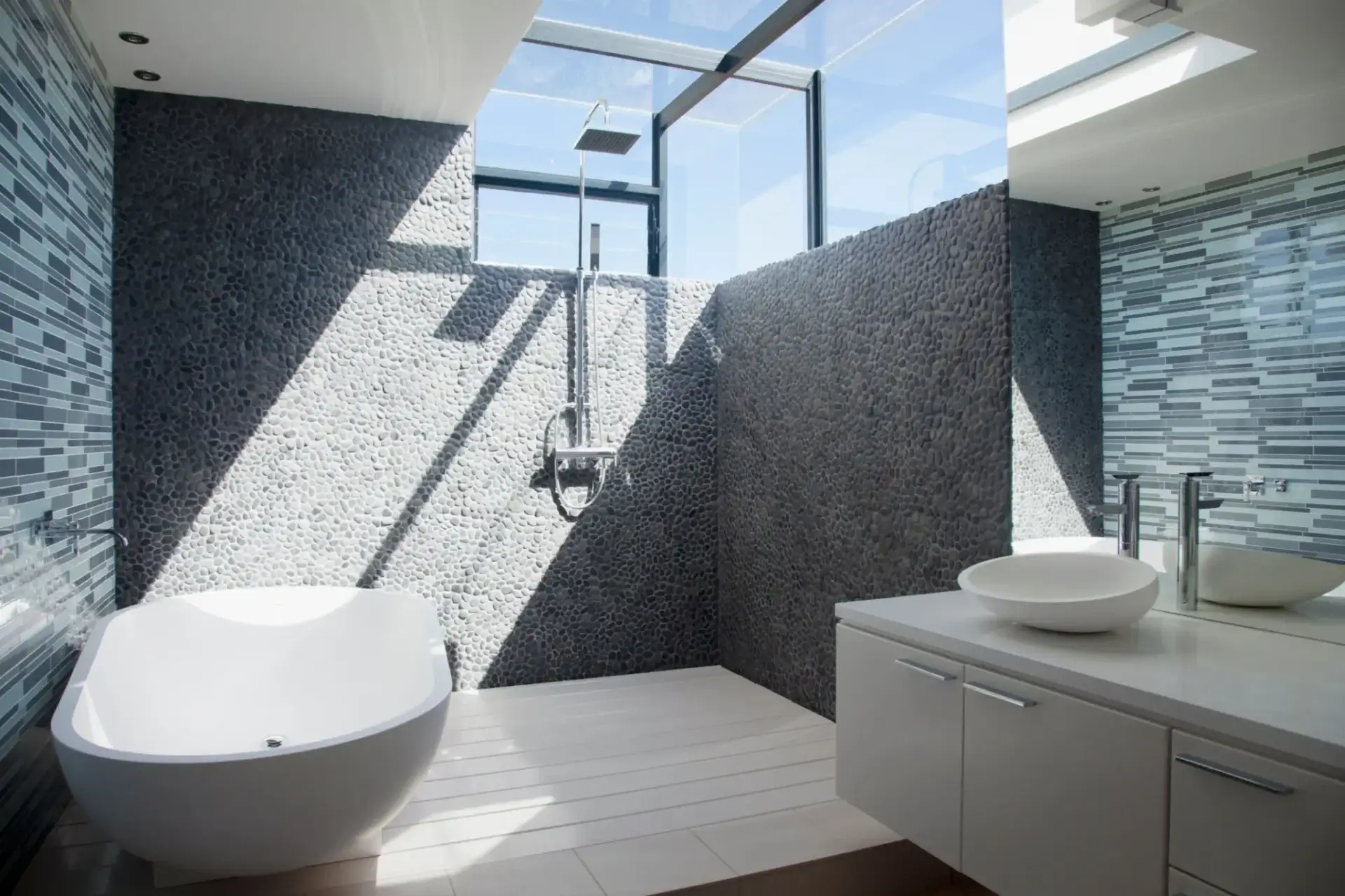 Modern bathroom with skylight and freestanding tub